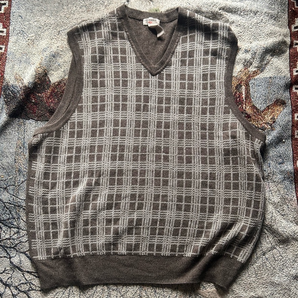 Large brown and white plaid sweater vest